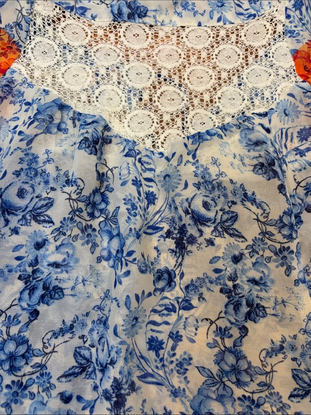 Fig & Flower blue, yellow & orange short sleeve semi-sheer top. Size M.
